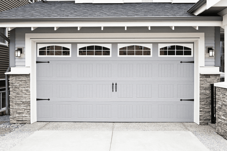 How Do You Properly Maintain a Garage Door to Extend Its Lifespan?